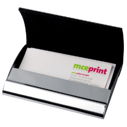 Executive metal business card holder finished in a chrome/leatherette combination with magnetic closure